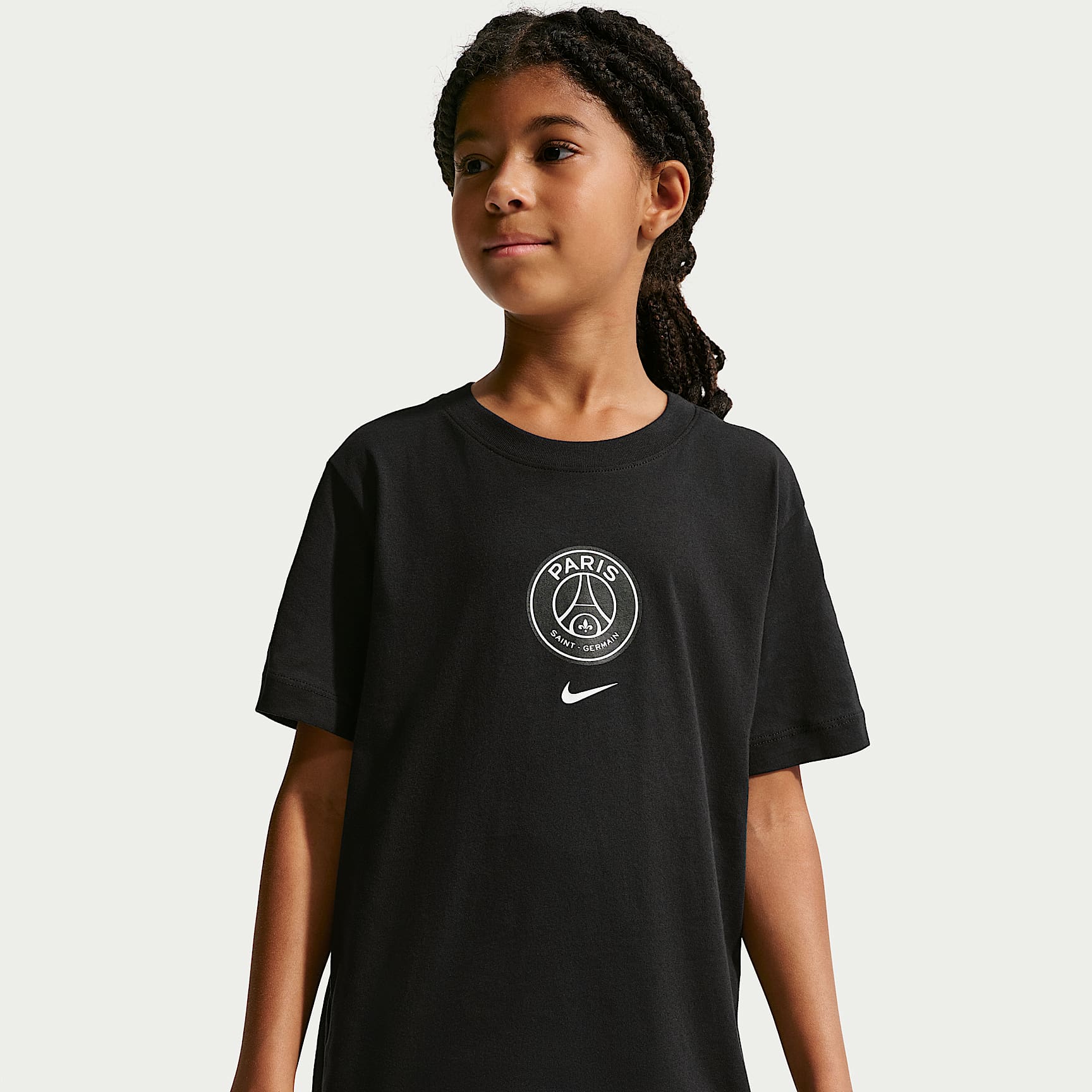 Paris Saint-Germain Older Kids' Nike Football T-shirt. Nike IL